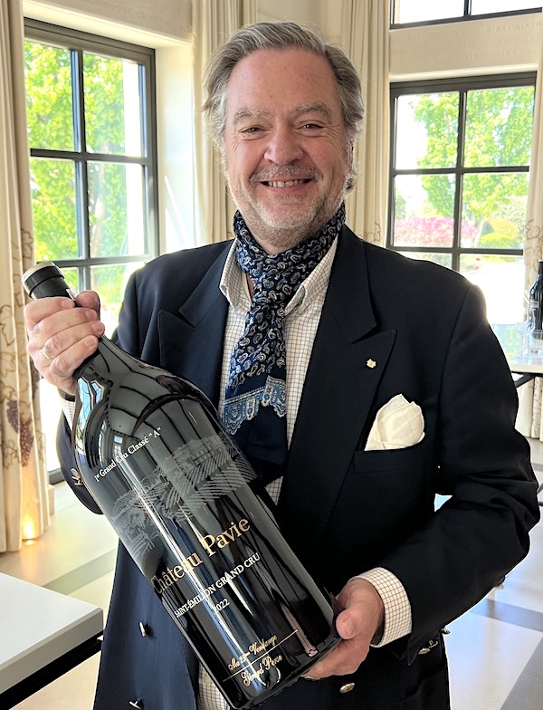 Ronald holding the new covet Pavie 2022 bottle